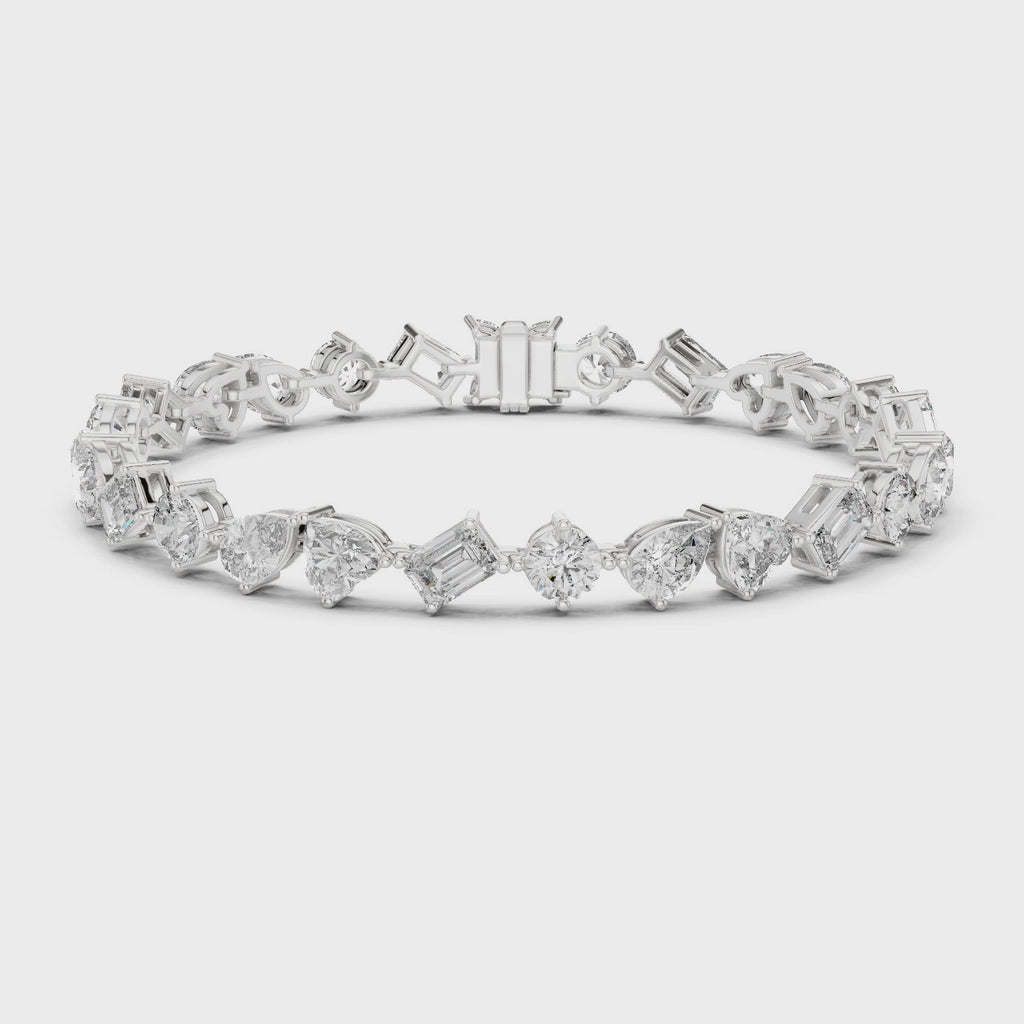 White gold bracelet side profile showcasing multi shape stone arrangement