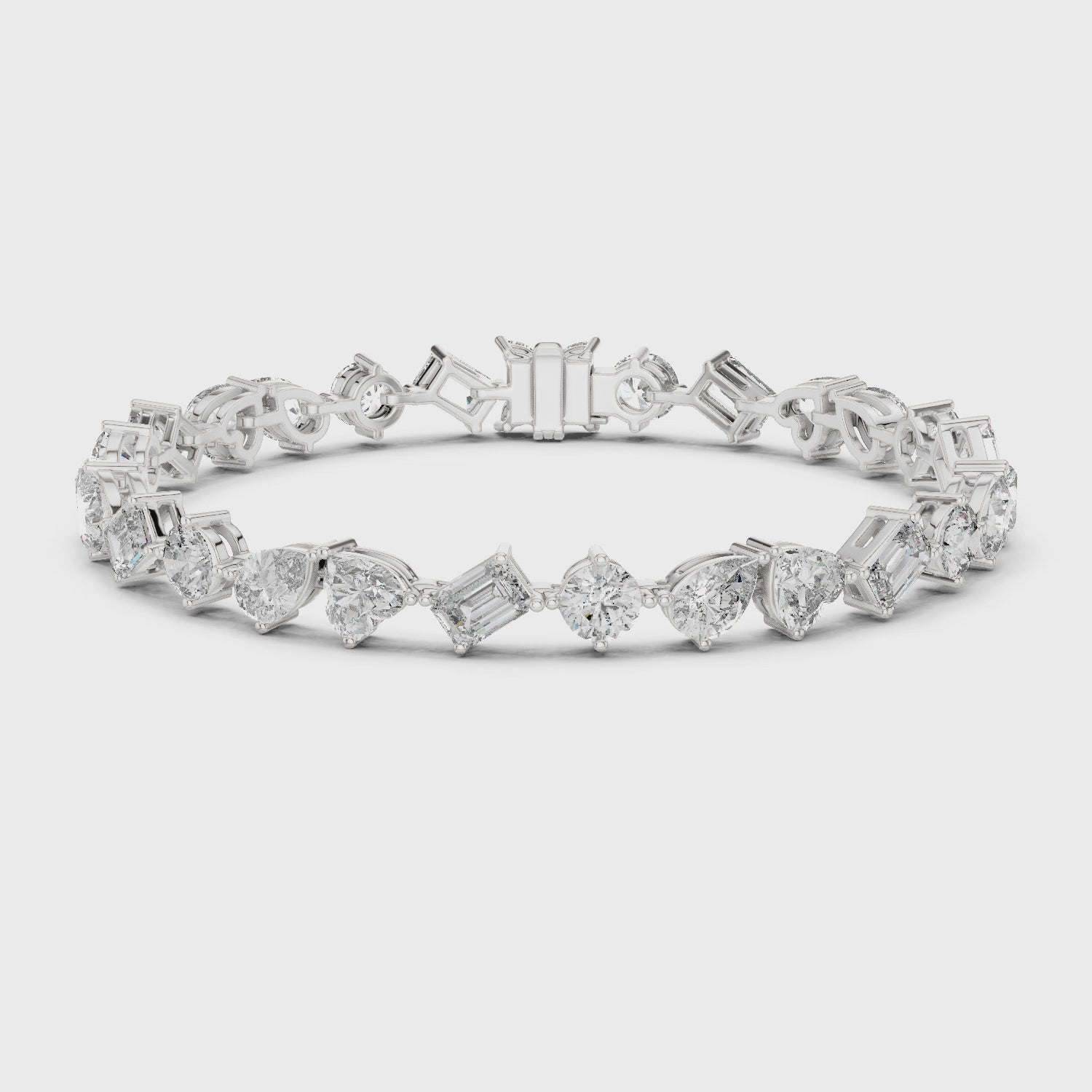 White gold bracelet side profile showcasing multi shape stone arrangement